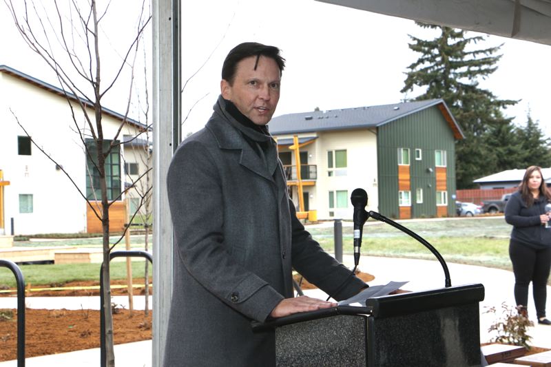 COURTESY GUARDIAN REAL ESTATE SERVICES - Tom Brenneke, who spoke at the opening of the NAYA affordable housing project that his company built, recently quit a city housing advisory panel.  